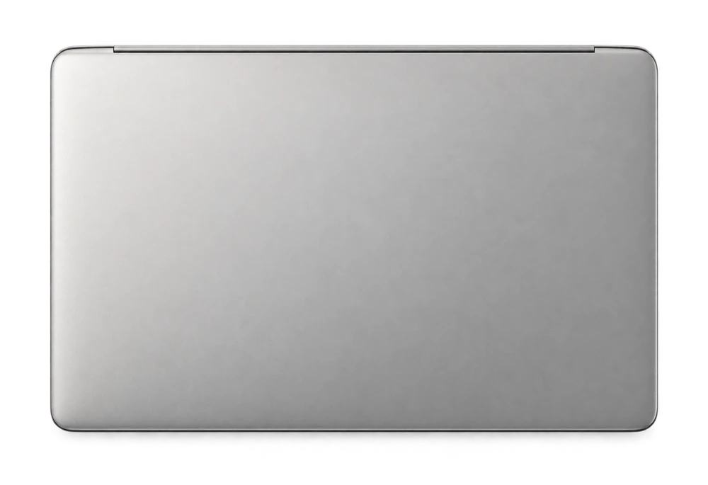 A silver laptop covered with Nik’s stickers